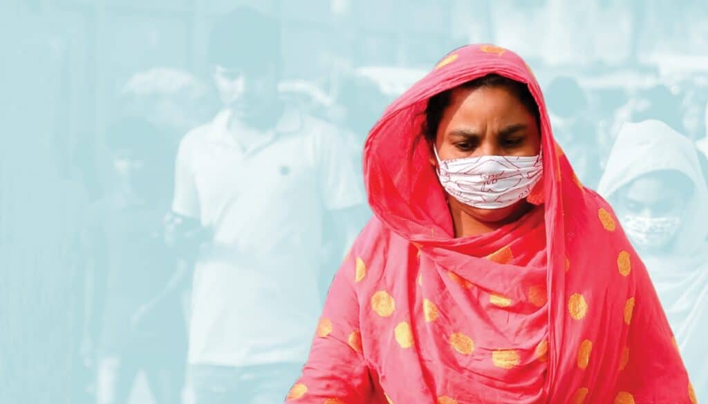 Garment worker with a cloth mask